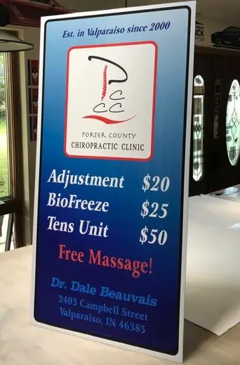 Tall printed price-list sign